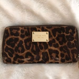 Michael Kors Cheetah zip around wallet